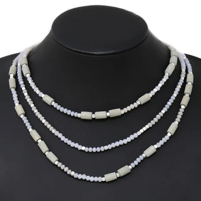 1. **Fernwood Whisper Necklace**  
2. **Twilight Glow Layered Necklace**  
3. **Elemental Harmony Beaded Necklace**